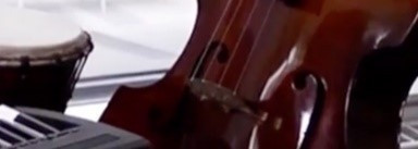 A photograph of a bass guitar.