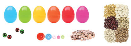 Six colourful eggs, four marbles, five buttons, a stack of pennies and an arrangement of different seeds and nuts.