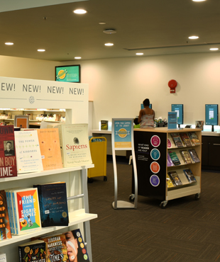 The New! New! New! stand at a Library location. 