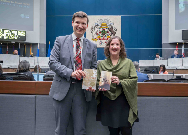 Freedom to Read Mayor and CEO at City Hall holding books 2026