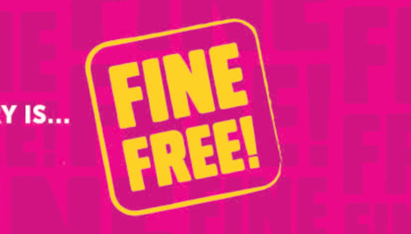 A pink banner with the text "Your Library is... Fine Free!"