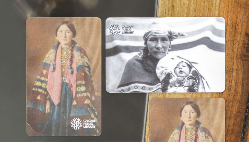 A photo of the Library membership cards available that feature family photographs of Tsuut'ina artist Glenna Cardinal.
