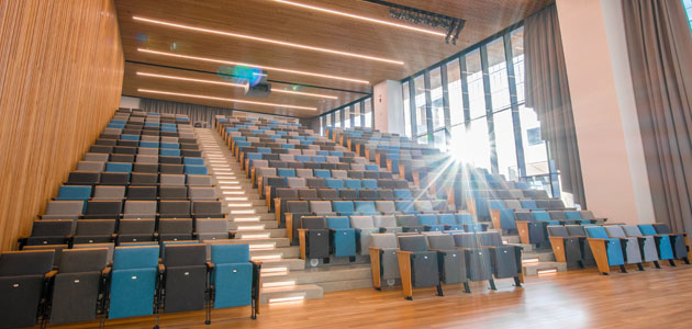 A photograph of the Patricia A. Whelan Performance Hall. In the photo, the chairs are set up in an auditorium-style format.