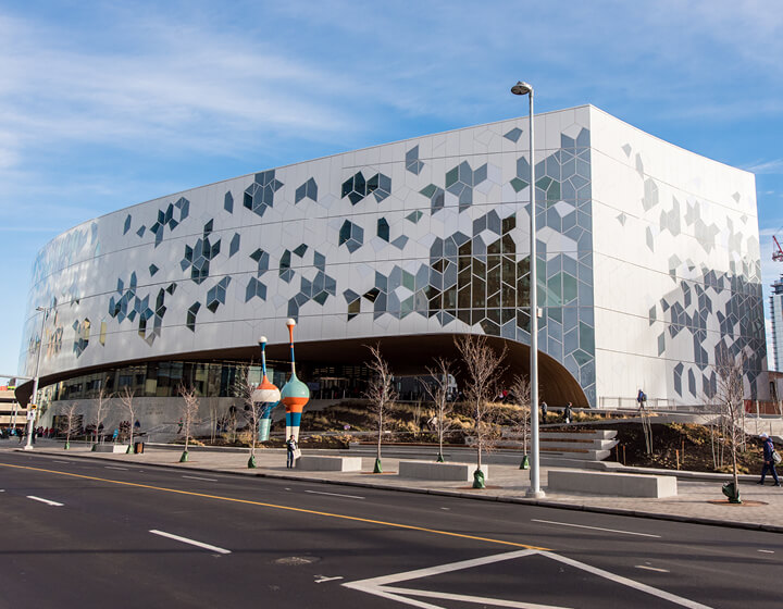 background image: Photograph of the exterior of Central Library. 
