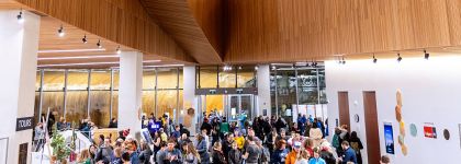 A crowd of people in the Central location of Calgary Public Library.