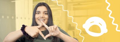 This is a picture of a staff member making a square with her fingers. She is on a yellow background, and beside her is an illustration of a crying baby's head. 
