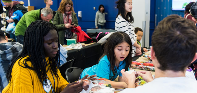 Photo of a group of people participating in an activity at a Calgary Public Library location. 
