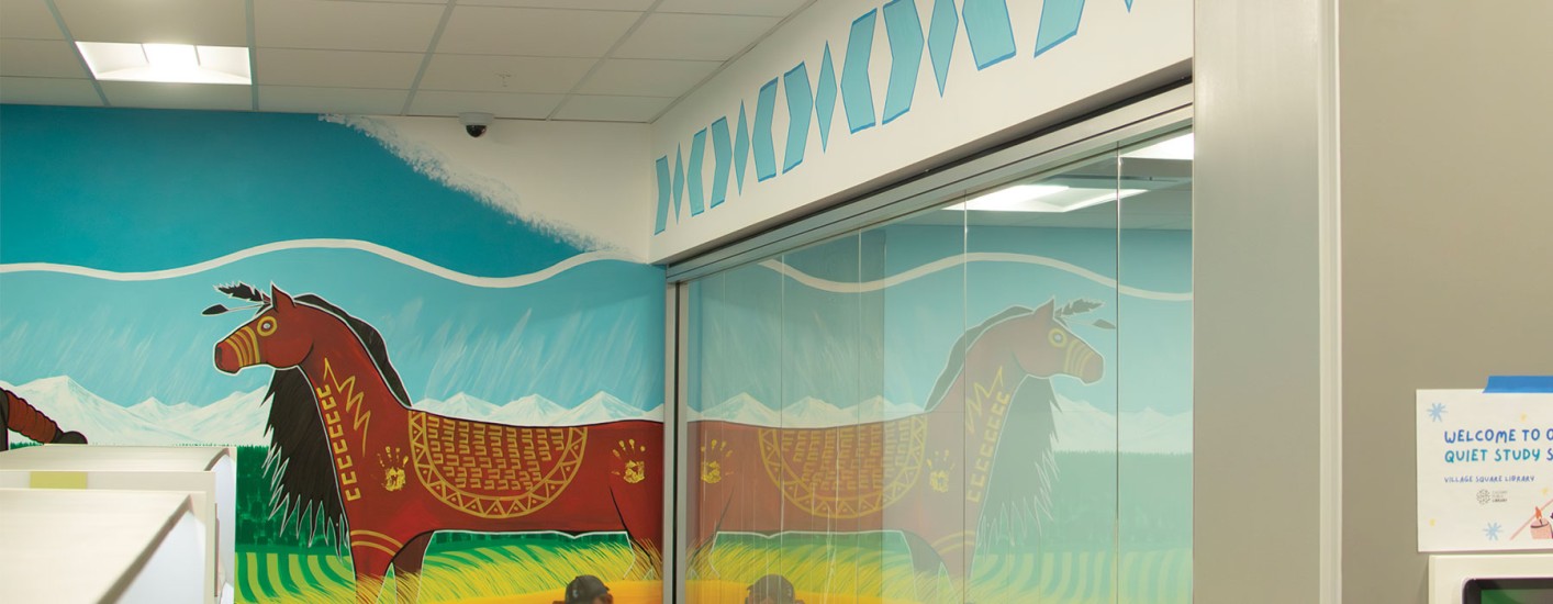 A stylied painting of a red horse with decorative markings stands against a blue and green background. The horse's reflection is visible in the glass wall of a quiet study space.