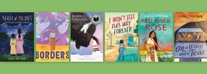 Display of young adult book covers arranged in a row.
