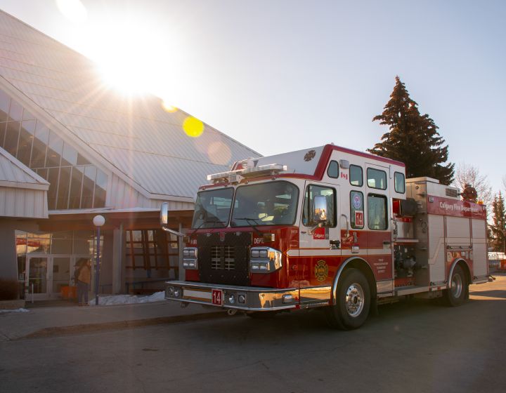 background image: A photo of a firetruck in front of Fish Creek Library. 
