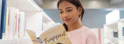 Teen reading a book