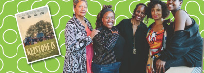 A group of black women with a green background and a copy of the book Keystone Is is to their left.