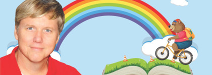 A smiling man in a red shirt is pictured on the left, with a colorful rainbow arching over an open book on the right. On top of the book, a cartoon bear wearing a red shirt, blue shorts, orange backpack, and red cap rides a bicycle through clouds and smal