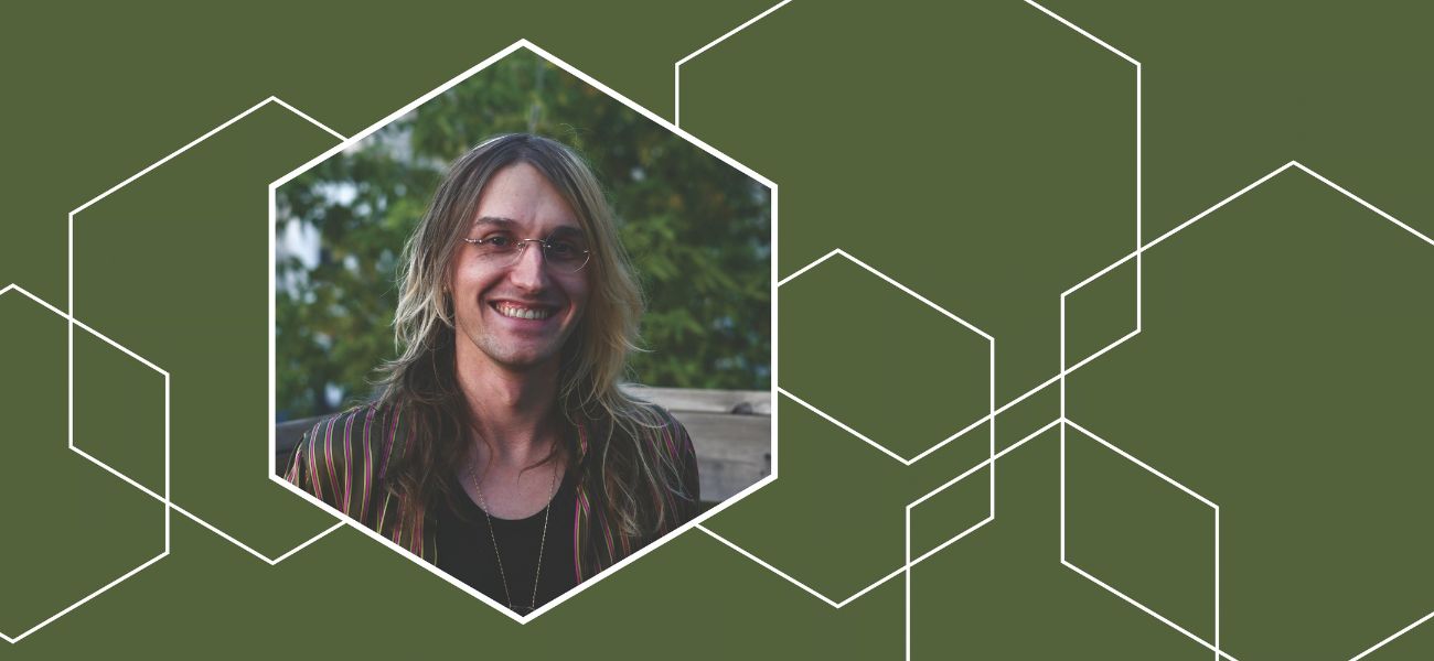 Musical Artist in residence Easy HD inside a hexagon frame on a green geometric background.