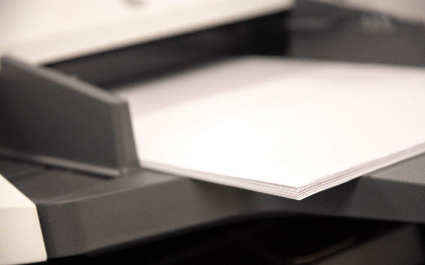 A printer with paper.