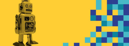 Vintage toy robot standing on a yellow background beside a pattern of blue and teal pixel-style squares.